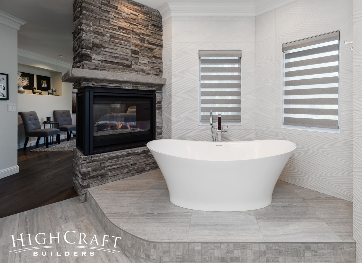 https://www.highcraft.net/wp-content/uploads/2021/06/bathroom-remodeling-fort-collins-co-stand-alone-white-tub-fireplace.jpg