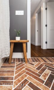 bathroom-remodel-brick-tile-flooring-doorway