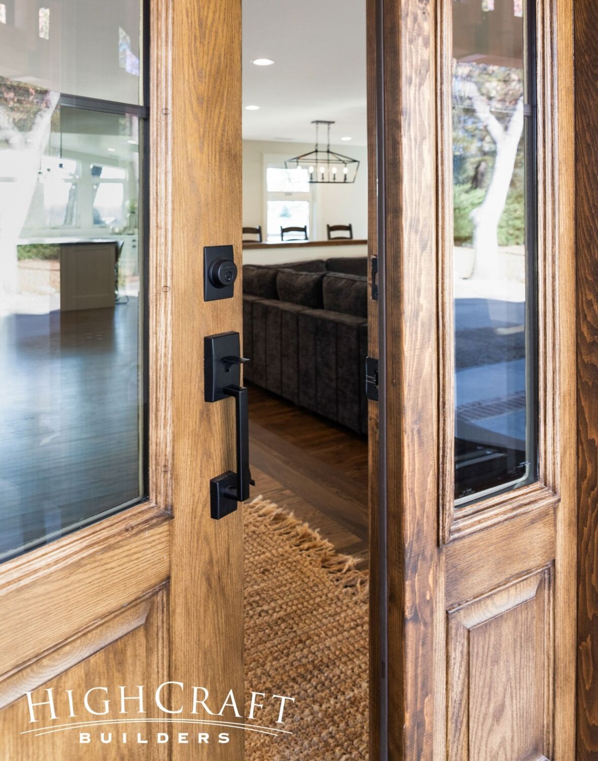 house-remodel-peek-through-front-door-Top-Remodeling-Company