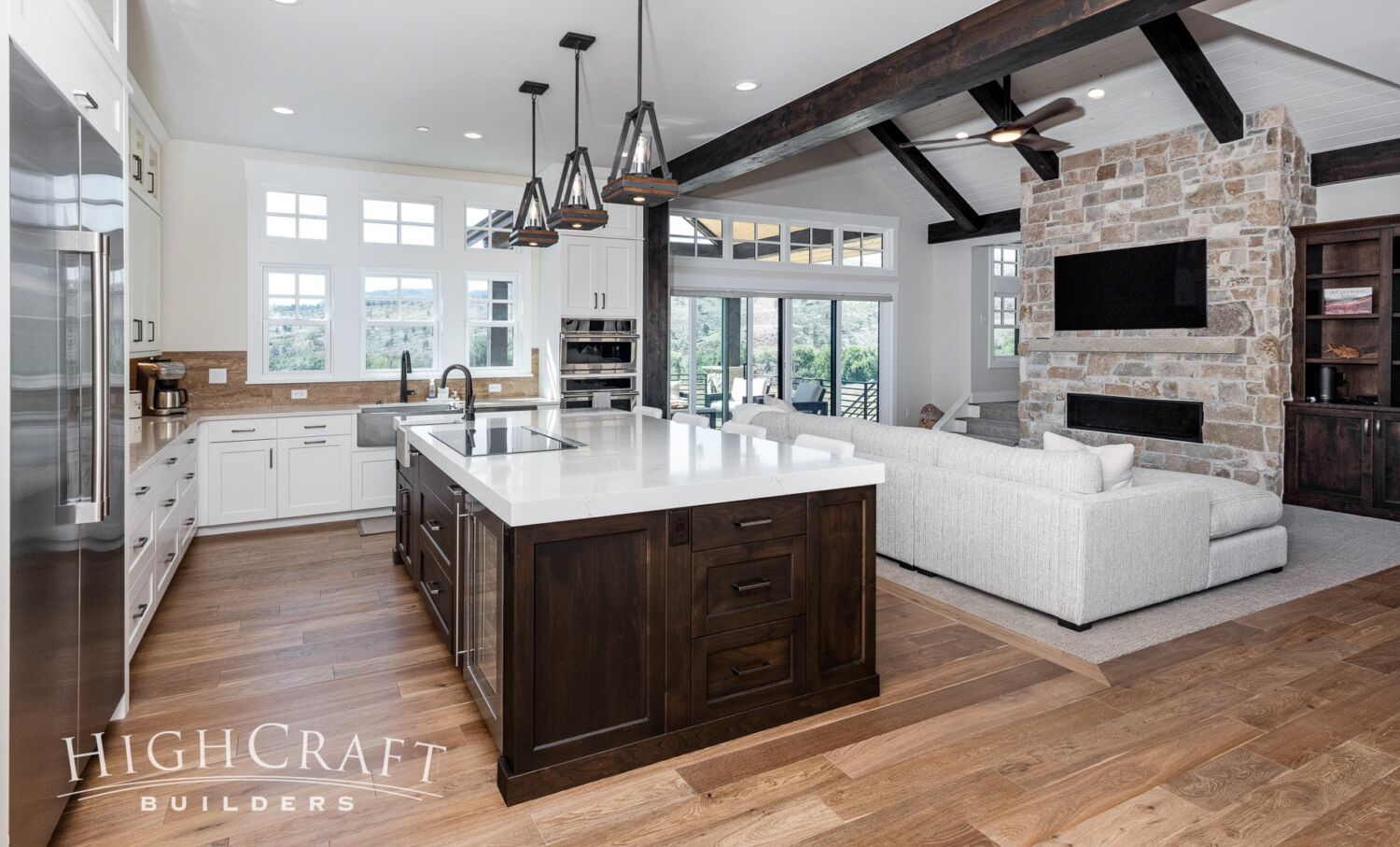 custom-home-builder-mountains-kitchen-great-room-fireplace