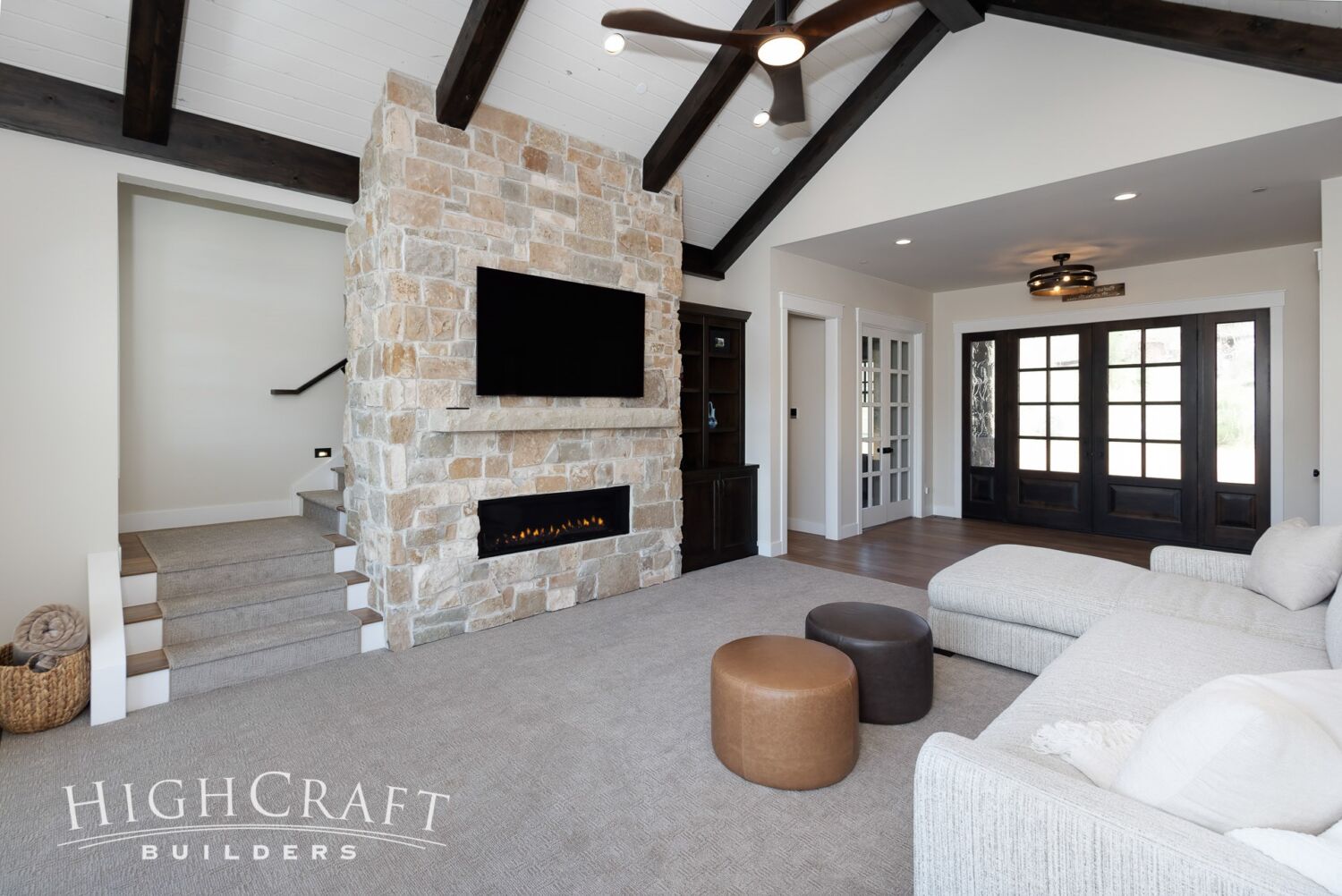 custom-home-builder-mountains-stone-fireplace-family-room