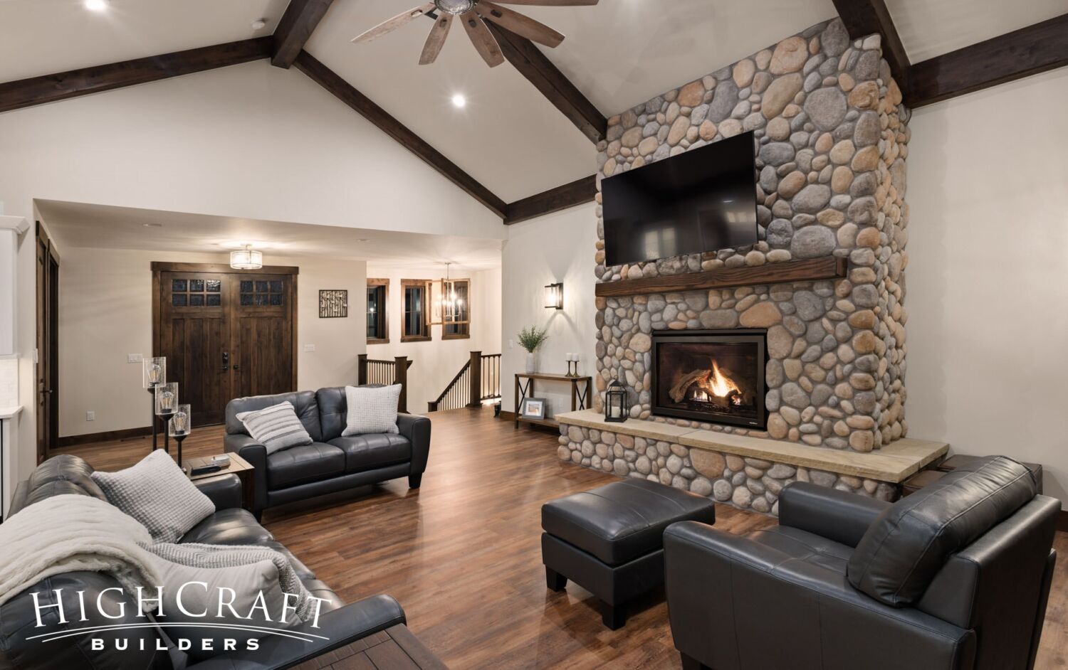 custom-home-builder-Berthoud-river-rock-fireplace-great-room