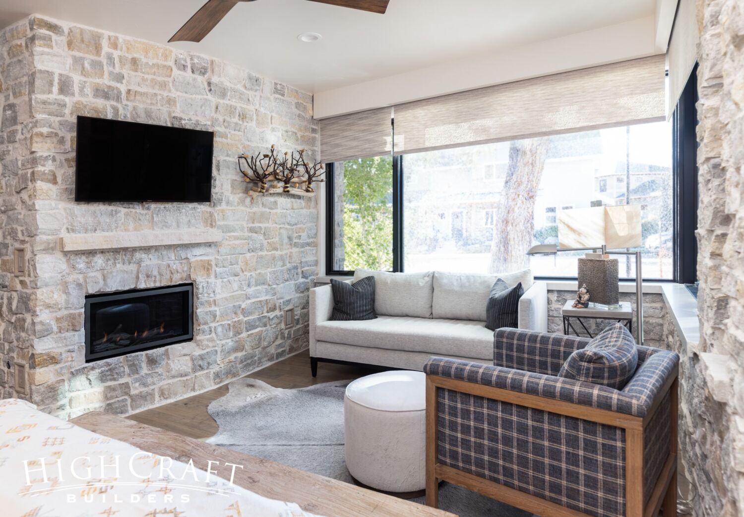 custom-home-builder-Fort-Collins-guest-bedroom-stone-fireplace-wall