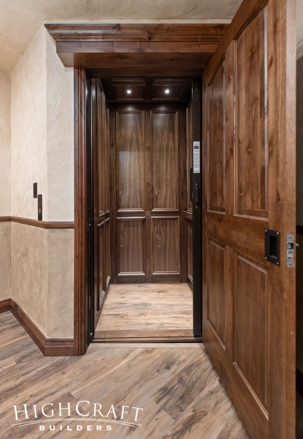 basement-remodel-fort collins-wood-paneled-residential-elevator