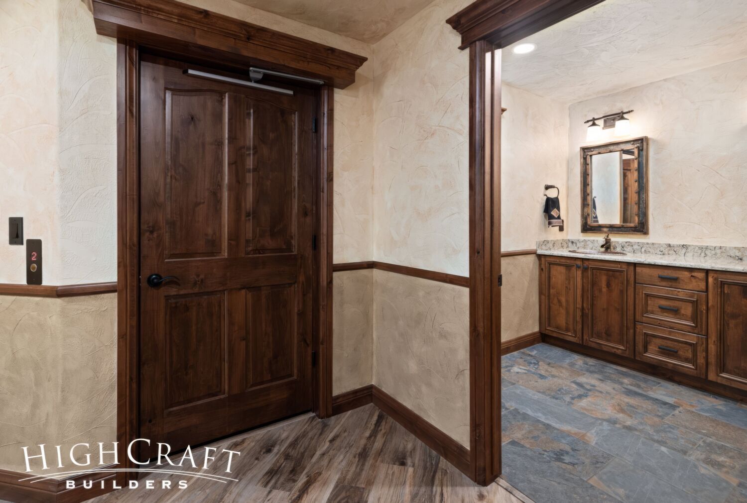 basement-remodel-Custom-Wood-Paneled-Residential-Elevator