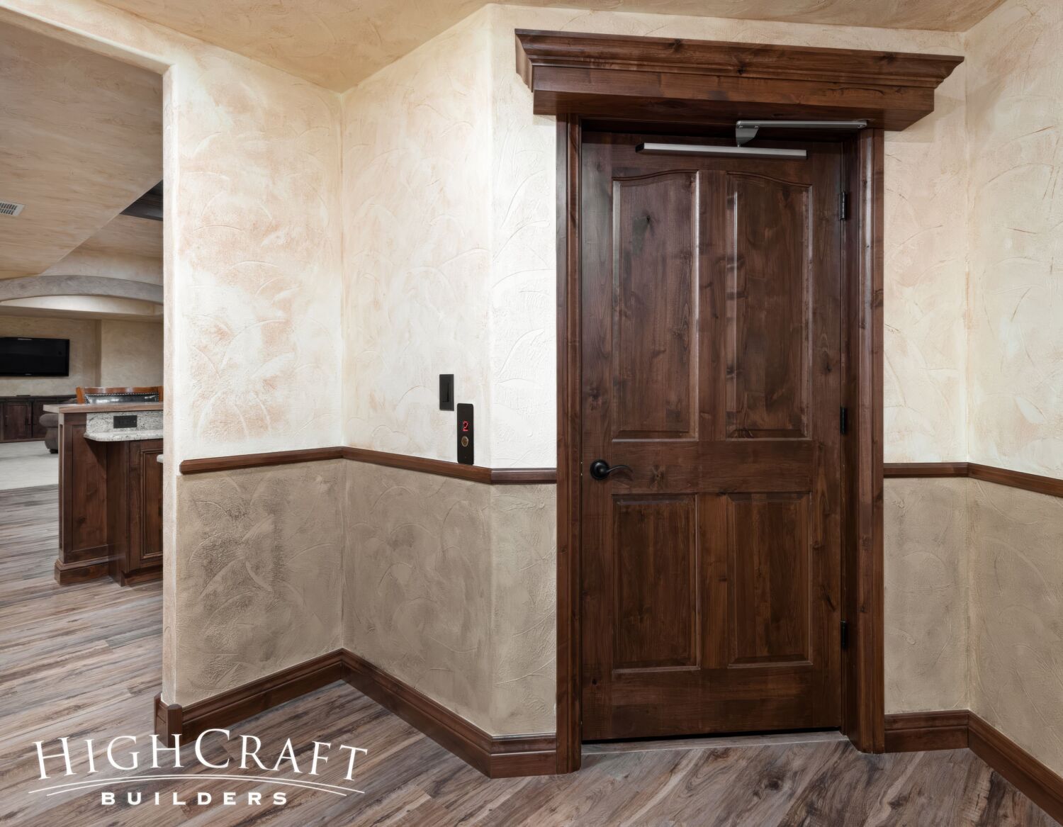 basement-remodel-Wood-Paneled-Residential-Elevator