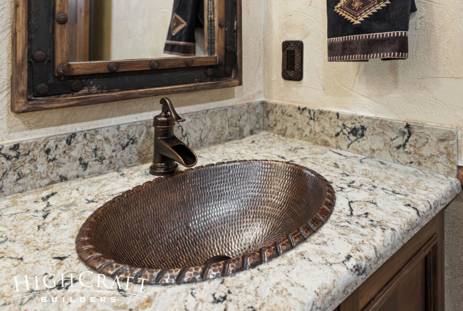 basement-remodel-Hammered-Bronze-Sink-Waterfall-faucet