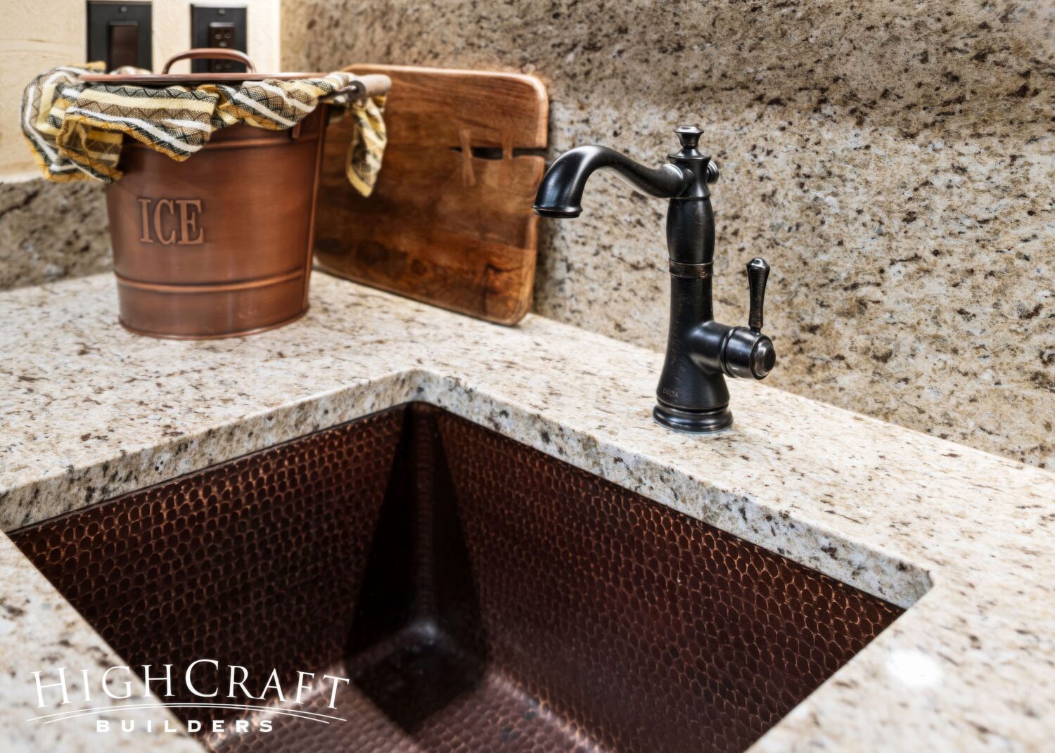 basement-remodel-wet-bar-hammered-metal-sink