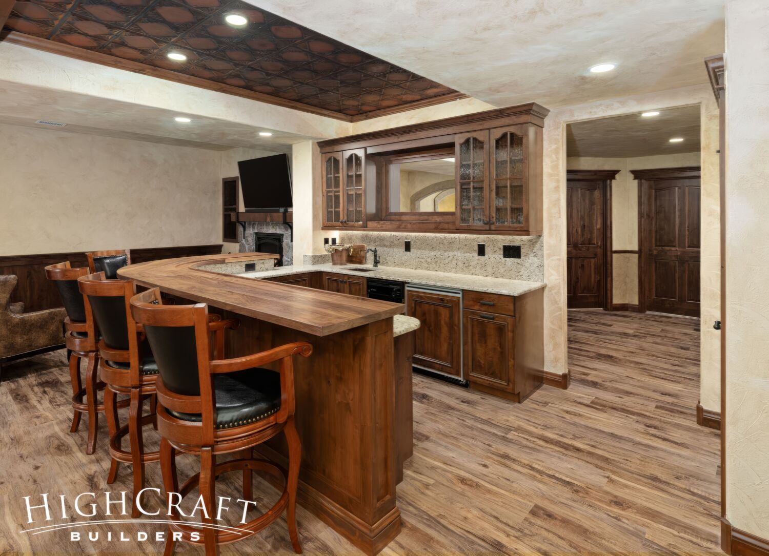 basement-remodel-wet-bar-western-style-seating-area